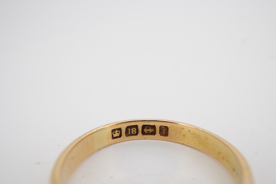 A late Victorian 18ct gold, three stone sapphire and two stone diamond set half hoop ring, size S, gross weight 4.8 grams.